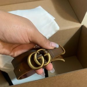 Brown Gucci belt